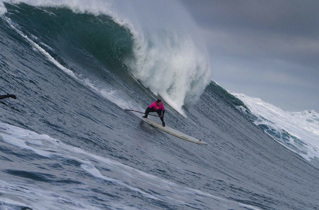 Wade going right at Nelscott Reef — Jamie Mitchell going left on the same wave